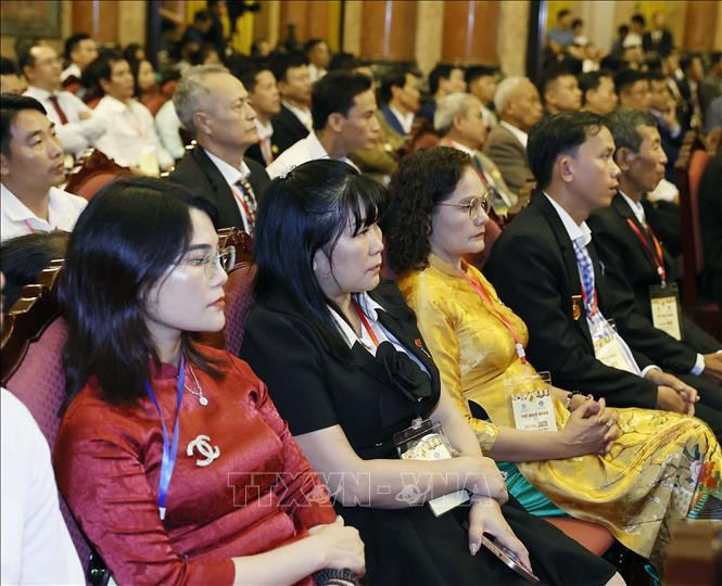 Các đại biểu tham dự buổi gặp mặt. (Ảnh: TTXVN)