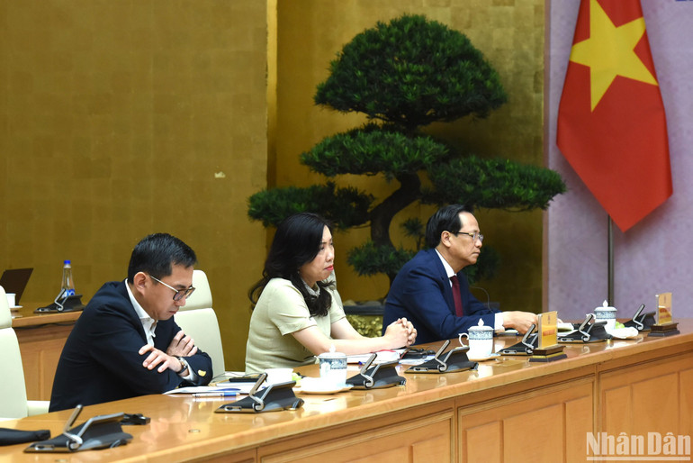 Các đại biểu tham dự tại điểm cầu Hà Nội. (Ảnh: TRẦN HẢI)