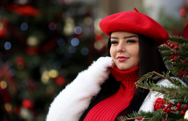 Người dân London đi chơi ở chợ Giáng sinh. (Nguồn: THX/TTXVN) Người dân London đi chơi ở chợ Giáng sinh. (Nguồn: THX/TTXVN)