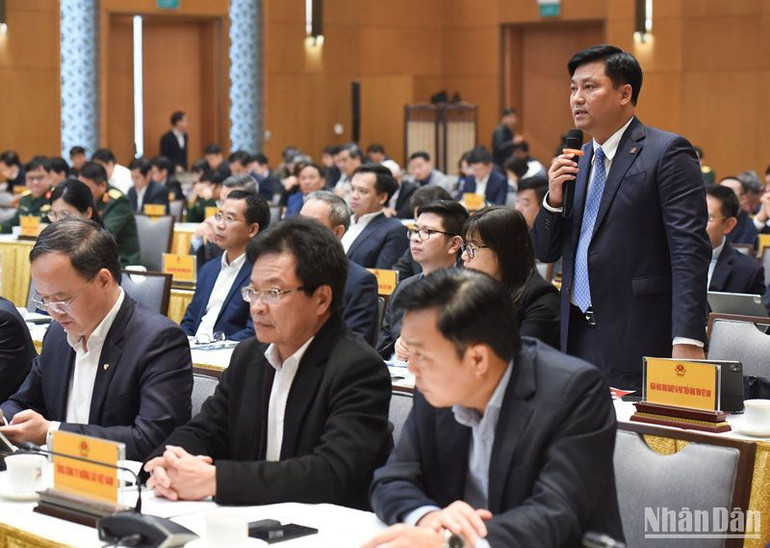 Tổng Giám đốc Ngân hàng Agribank Phạm Toàn Vượng phát biểu ý kiến tại Hội nghị. (Ảnh: TRẦN HẢI)