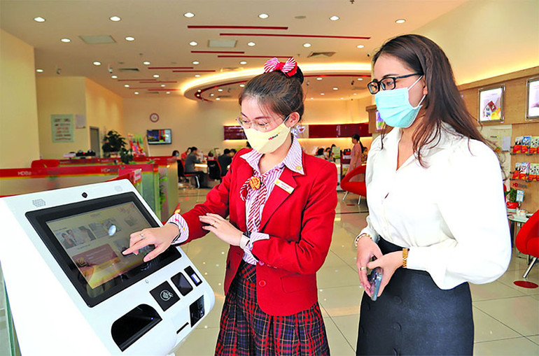 Chuyển đổi số ngân hàng giúp gia tăng khả năng tiếp cận vốn, thúc đẩy thanh toán không dùng tiền mặt.