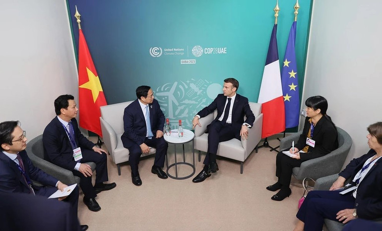 Thủ tướng Phạm Minh Chính gặp Tổng thống Pháp Emmanuel Macron.