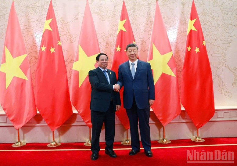 Thủ tướng Chính phủ Phạm Minh Chính và Tổng Bí thư, Chủ tịch Tập Cận Bình. (Ảnh: Nhật Bắc)