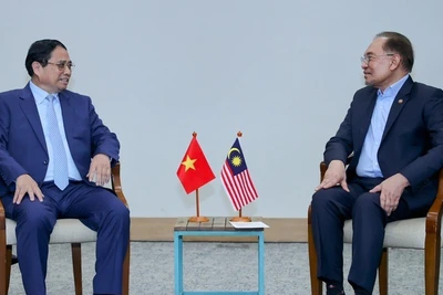 Thủ tướng Chính phủ Phạm Minh Chính đề nghị Malaysia tăng cường hợp tác chuyển đổi số, trong đó có hỗ trợ xây dựng Trung tâm dữ liệu quốc gia kết nối với Trung tâm dữ liệu của ASEAN. (Ảnh: VGP/Nhật Bắc)