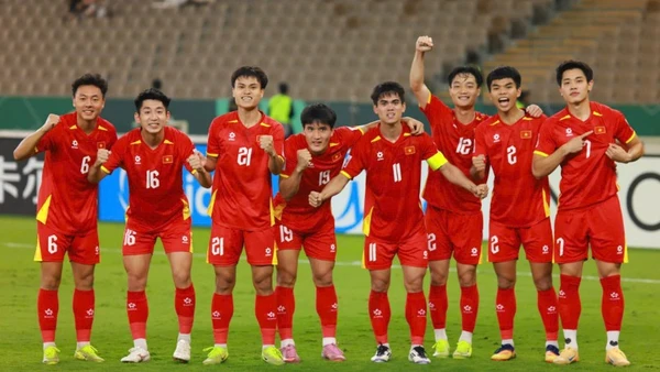 Đội tuyển U23 Việt Nam ăn mừng chiến thắng trong lượt trận vòng bảng tại Giải U23 châu Á. (Ảnh: Diệp Sơn Nam)