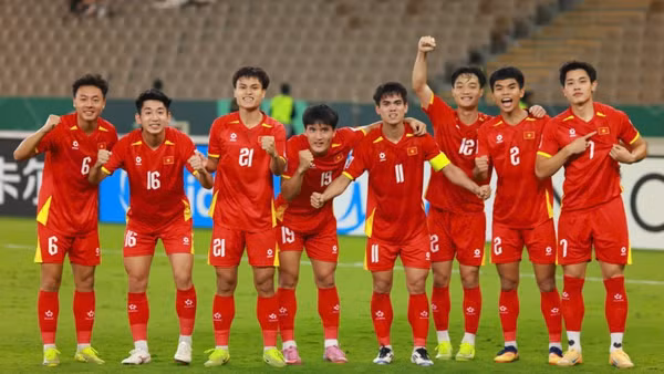 Đội tuyển U23 Việt Nam ăn mừng chiến thắng trong lượt trận vòng bảng tại Giải U23 châu Á. (Ảnh: Diệp Sơn Nam)