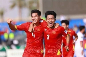 Trung vệ Hiểu Minh ghi bàn nâng tỷ số 2-0 cho U23 Việt Nam trong trận đấu với Jordan tối 6/1. (Ảnh: AFC/TTXVN)
