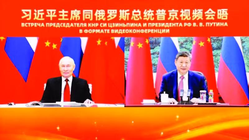 Hai nhà lãnh đạo Nga và Trung Quốc hội đàm trực tuyến. (Ảnh: TÂN HOA XÃ)