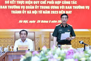 Đại tướng Phan Văn Giang và đồng chí Trần Đức Thắng đồng chủ trì hội nghị.