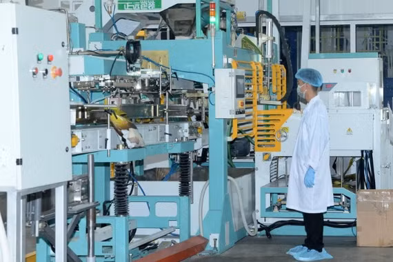 Dây chuyền chế biến gạo của Công ty TNHH Lúa gạo Việt Nam (Vinarice). (Ảnh: ĐỨC AN)