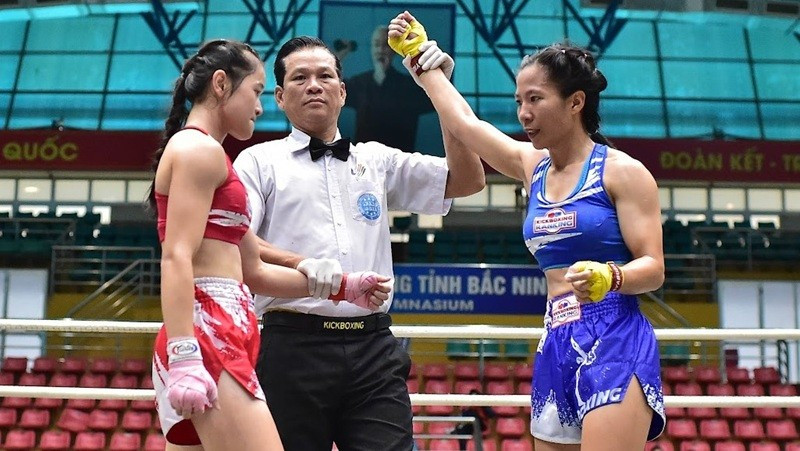 Bùi Thị Yến Nhi (giáp xanh) tiếp tục thể hiện được khả năng tại giải năm nay. (Ảnh: KFV) dks-4496.jpg