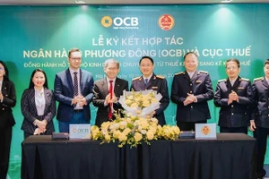 Quang cảnh Lễ ký kết hợp tác. (Ảnh KỲ DUYÊN)