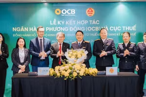 Quang cảnh Lễ ký kết hợp tác. (Ảnh KỲ DUYÊN)