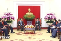 Thường trực Ban Bí thư Lương Cường tiếp Đại sứ Trung Quốc Hà Vĩ. (Ảnh: Phương Hoa/TTXVN)