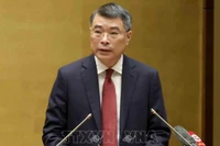Đồng chí Lê Minh Hưng, Ủy viên Bộ Chính trị, Bí thư Trung ương Đảng, Trưởng Ban Tổ chức Trung ương trình bày các nội dung chính, trọng tâm việc triển khai tổng kết Nghị quyết số 18-NQ/TW ngày 25/10/2017 của BCHTW Đảng khoá XII "Một số vấn đề về tiếp tục đổi mới, sắp xếp tổ chức bộ máy của hệ thống chính trị tinh gọn, hoạt động hiệu lực, hiệu quả". (Ảnh: Phương Hoa/TTXVN)