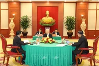 Tổng Bí thư Đảng Cộng sản Việt Nam Nguyễn Phú Trọng, Chủ tịch Đảng Nhân dân Campuchia (CPP) Samdech Techo Hun Sen và Tổng Bí thư Đảng Nhân dân Cách mạng Lào, Chủ tịch nước Lào Thongloun Sisoulith tại cuộc gặp cấp cao Việt Nam-Campuchia-Lào. (Ảnh: TTXVN) 