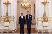 Thủ tướng Chính phủ Phạm Minh Chính hội kiến Đại Công tước Luxembourg Henri. (Ảnh: TTXVN)