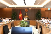 Phó Thủ tướng Lê Minh Khái chủ trì cuộc họp. (Ảnh: VGP)