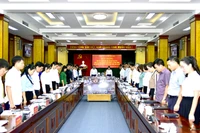 Các đại biểu dự hội nghị ở các điểm cầu đã dành phút mặc niệm tưởng nhớ Tổng Bí thư Nguyễn Phú Trọng.