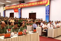 Lãnh đạo Bộ Công an và lãnh đạo Tỉnh ủy, Ủy ban nhân dân tỉnh Đồng Nai cùng các đại biểu tham dự hội nghị.