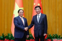 Thủ tướng Phạm Minh Chính hội kiến Chủ tịch Chính hiệp Trung Quốc Vương Hộ Ninh. (Ảnh: Nhật Bắc)