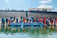 Thả 100 nghìn con cá giống xuống lòng hồ Thủy điện Sông Tranh 2