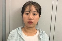 Phan Thị Kim Tuyến tại cơ quan công an.