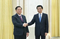 Đồng chí Nguyễn Trọng Nghĩa hội kiến đồng chí Vương Hộ Ninh.