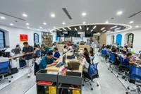 Không khí làm việc sôi nổi tại tòa soạn hội tụ Báo Nhân Dân điện tử. Ảnh: thành đạt