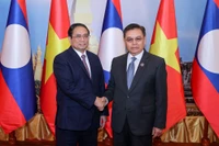 Thủ tướng Chính phủ Phạm Minh Chính hội kiến Chủ tịch Quốc hội Saysomphone Phomvihane.