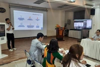 Quang cảnh hội thảo “Ứng dụng công nghệ trong xây dựng trường học thông minh-Thúc đẩy phát triển thành phố thông minh”.
