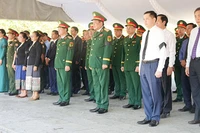 Thượng tướng Võ Minh Lương cùng lãnh đạo tỉnh Quảng Trị và tỉnh Savannakhet dự lễ viếng, truy điệu và an táng hài cốt liệt sĩ Việt Nam hy sinh tại nước bạn Lào.