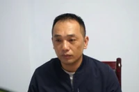 Đối tượng Zhangmao tại cơ quan điều tra. (Ảnh: Công an cung cấp)