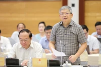Thiếu tướng Hoàng Anh Tuyên, Phó Chánh văn phòng Bộ Công an trả lời tại họp báo. (ẢNH: VGP)