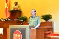 Bộ trưởng Công an Tô Lâm trình bày Tờ trình về dự án Luật sửa đổi, bổ sung một số điều của Luật Công an nhân dân. (Ảnh: ĐĂNG KHOA)