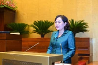 Thống đốc Ngân hàng Nhà nước Việt Nam Nguyễn Thị Hồng trình bày Tờ trình dự án Luật Phòng, chống rửa tiền (sửa đổi). (Ảnh: DUY LINH)