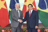 Thủ tướng Phạm Minh Chính và Tổng thống Brazil Luiz Inácio Lula da Silva. (Ảnh: TRẦN HẢI)