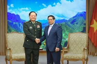 Thủ tướng Phạm Minh Chính và Thượng tướng Trương Hựu Hiệp, Ủy viên Bộ Chính trị, Phó Chủ tịch Quân ủy Trung ương Trung Quốc. (Ảnh: Trần Hải)