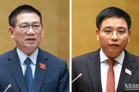 Phó Thủ tướng Chính phủ, Bộ trưởng Tài chính Hồ Đức Phớc (trái) và Bộ trưởng Giao thông vận tải Nguyễn Văn Thắng. (Ảnh: BÁO NHÂN DÂN)