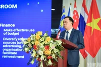 Nhà báo Ngô Việt Anh chia sẻ thực tiễn triển khai mô hình tòa soạn số và quá trình chuyển đổi số nói chung tại Báo Nhân Dân thời gian qua. 