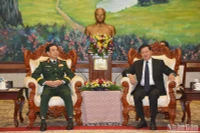 Đại tướng Phan Văn Giang tới chào xã giao Tổng Bí thư, Chủ tịch nước Lào Thongloun Sisoulith. (Ảnh: TRỊNH DŨNG)