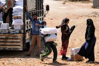 Hàng triệu người dân Syria sống dựa vào viện trợ nhân đạo. (Ảnh REUTERS)