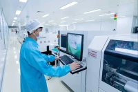 Dây chuyền sản xuất công nghệ cao của Công ty TNHH một thành viên Công nghệ cao Điện Quang, Khu Công nghệ cao TP Hồ Chí Minh. (Ảnh MAI HƯƠNG)