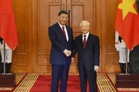 Tổng Bí thư Nguyễn Phú Trọng với Tổng Bí thư, Chủ tịch Trung Quốc Tập Cận Bình. (Ảnh: ĐĂNG KHOA)