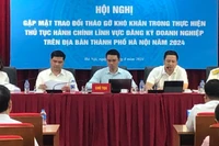 Sở Kế hoạch và Đầu tư Hà Nội tổ chức hội nghị tháo gỡ khó khăn cho doanh nghiệp khi thực hiện thủ tục đăng ký. 
