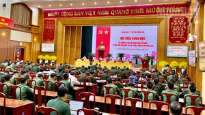 Quang cảnh hội thảo khoa học tại Quân khu 7. 
