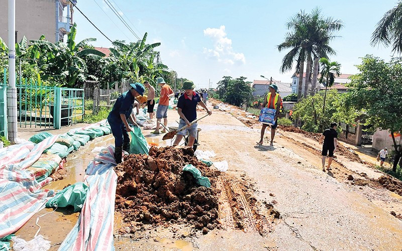 Khu vực đê tại xã Đa Phúc (Hà Nội) vừa xảy ra sự cố sạt trượt vào đầu tháng 10 do ảnh hưởng của hoàn lưu bão số 11. 