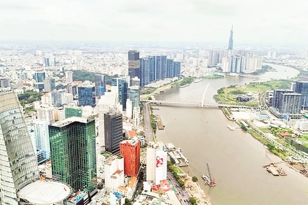 Là đô thị phát triển năng động, Thành phố Hồ Chí Minh có sức hấp dẫn dòng vốn đầu tư từ nước ngoài. (Ảnh THẾ ANH)