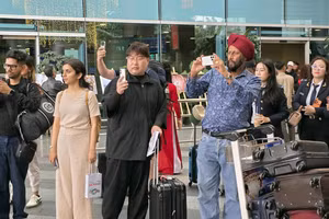 Khách quốc tế tại Cảng hàng không quốc tế Đà Nẵng. (Ảnh: TTXVN)