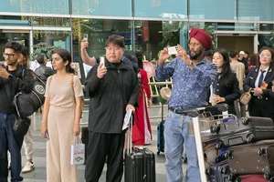 Khách quốc tế tại Cảng hàng không quốc tế Đà Nẵng. (Ảnh: TTXVN)